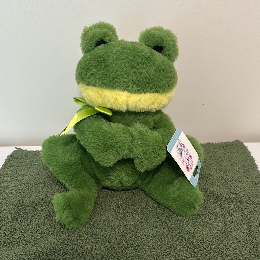 Green Stuffed Frog Toy with Yellow Accents
